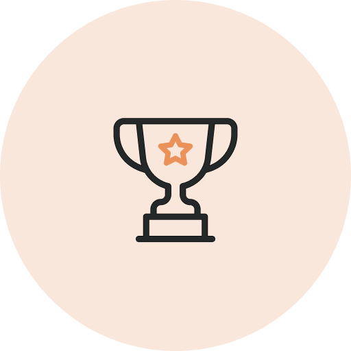 An icon of a trophy with a star in the center, outlined in black, set against an orange circular background.
