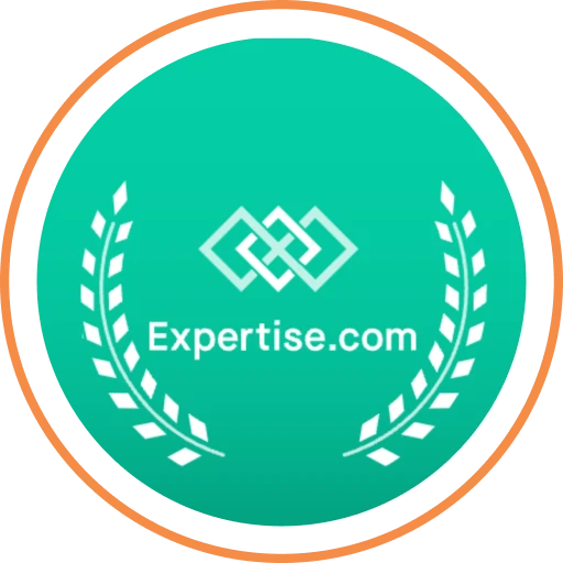 A round, teal badge with the text "Expertise.com" and a decorative laurel wreath design surrounding the text, symbolizing top-tier Texas DWI Attorney Reviews.